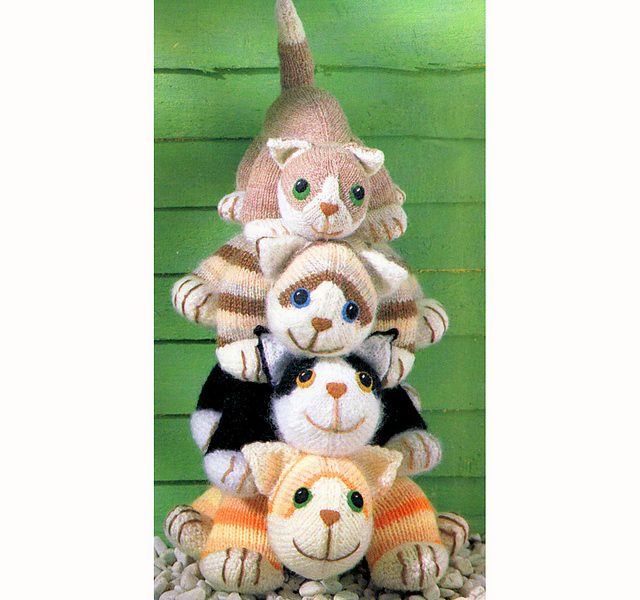 Four knitted cats – tabby, ginger, black-and-white and moggy knit patterns