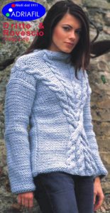 Free knitting pattern for a high necked sweater with criss cross cables in the front, this sweater will keep you super warm with the use of chunky weight yarn.