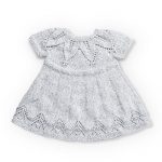 Free knitting pattern for a baby dress with a fairy leaves stitch detail. Suitable for 6, 12 and 18 months.