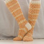 Free Knitting Pattern for Women's Knee-High Socks with lace stitch.
