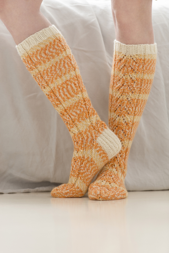 Free Knitting Pattern for Women's Knee-High Socks with lace stitch.