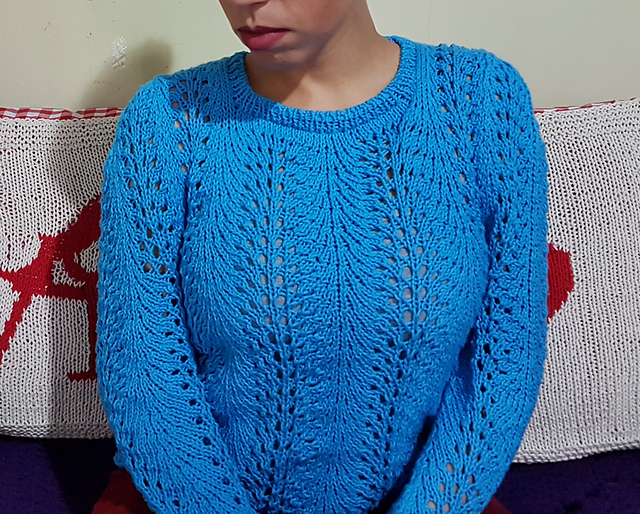 Feather and Fan lace stitch pullover free knitting pattern.