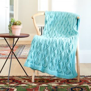 Free Knitting Pattern for a Leafy Lace Green Afghan.