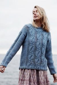 Free Knitting Pattern for a Women's Cabled and Drop Stitch Sweater.