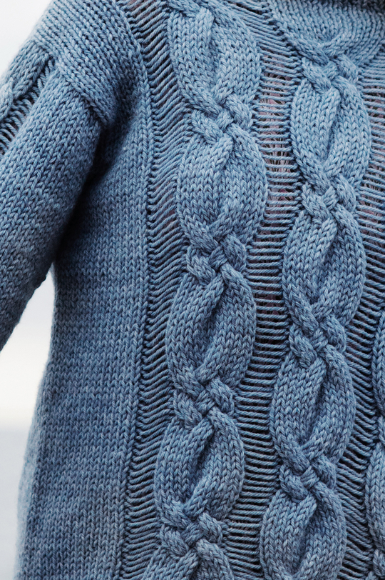 Free Knitting Pattern for a Women's Cabled and Drop Stitch Sweater.