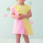 Free Knitting Pattern for a Flore Baby Dress. Sizes: 6 months, 12 months, 18 months, 2 years and 4 years Cute two toned baby dress ruffles.