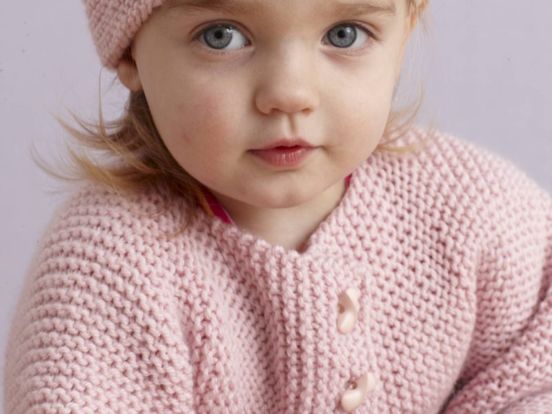 Free Knitting Pattern for a Strawberry Pink Sideways Baby Cardigan and Hat