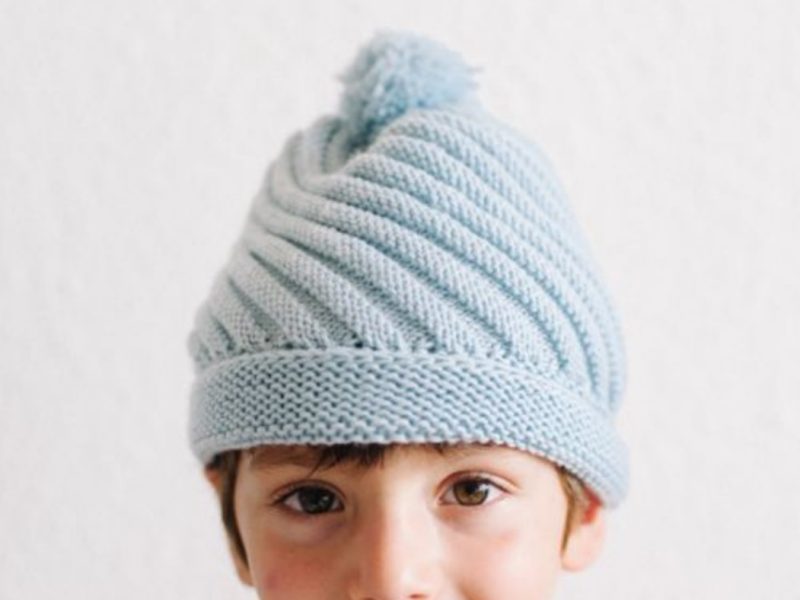 Free Knitting Pattern for a Diagonal Rib Swirl Beanie with Pompom