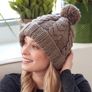 Free knitting pattern for a cable hat with rib stitch edge