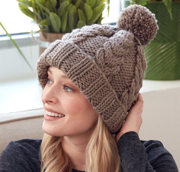 Free knitting pattern for a cable hat with rib stitch edge