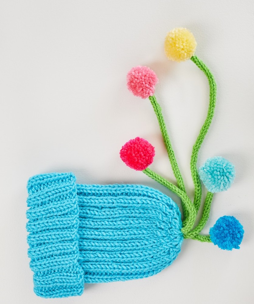 Free Knitting Pattern for Ribbed Hat with Pompom Tassels
