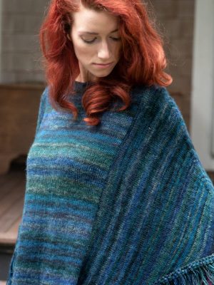 KNITTED PONCHO WITH FRINGING THE CARAVAN