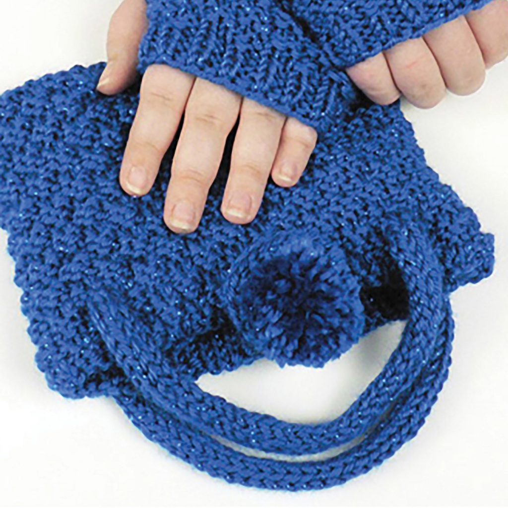 Free knitting pattern for girls wristlets and purse