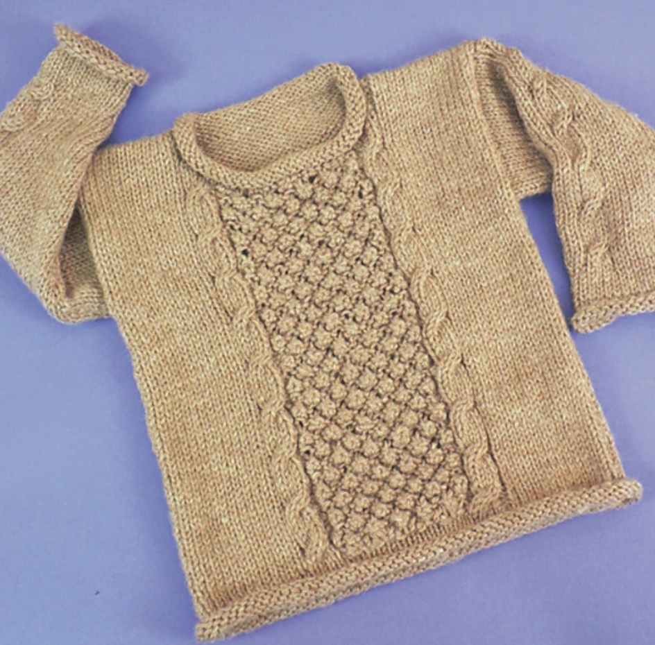 Free knitting pattern for a child aran pullover