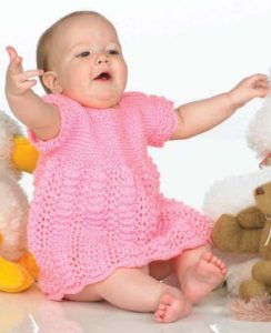 Free Knitting Pattern for a Baby Dress with Feather and Fan