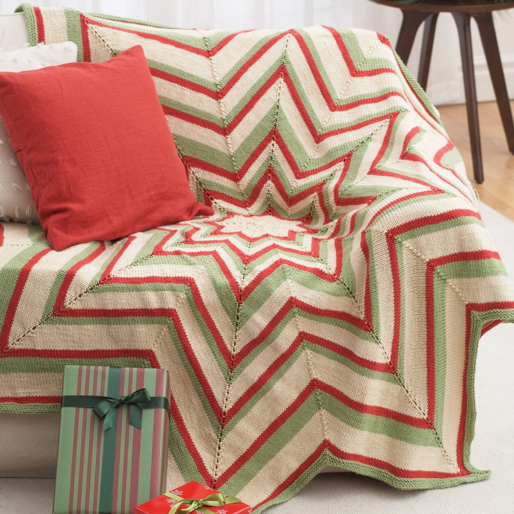 Free knitting pattern for a star shaped Christmas blanket