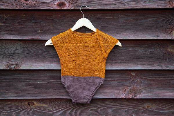 Free knit pattern for a baby romper