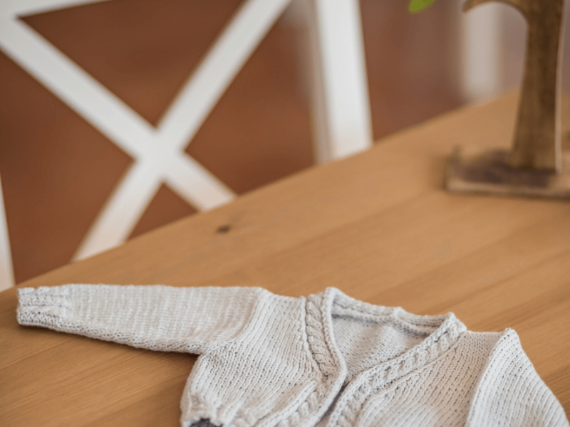 Free Knitting Pattern for a Baby Cardigan with Cables for Newborns