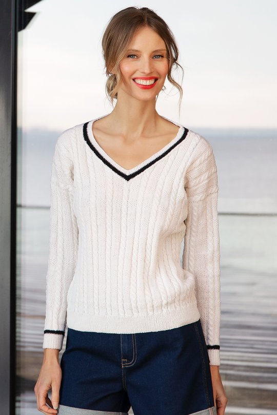 Classic sailor knit sweater. Easy and free knitting pattern for a woman's sweater with cables and v-neck.