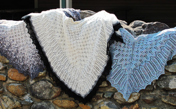 Free knit pattern for a fir cone lace shawl