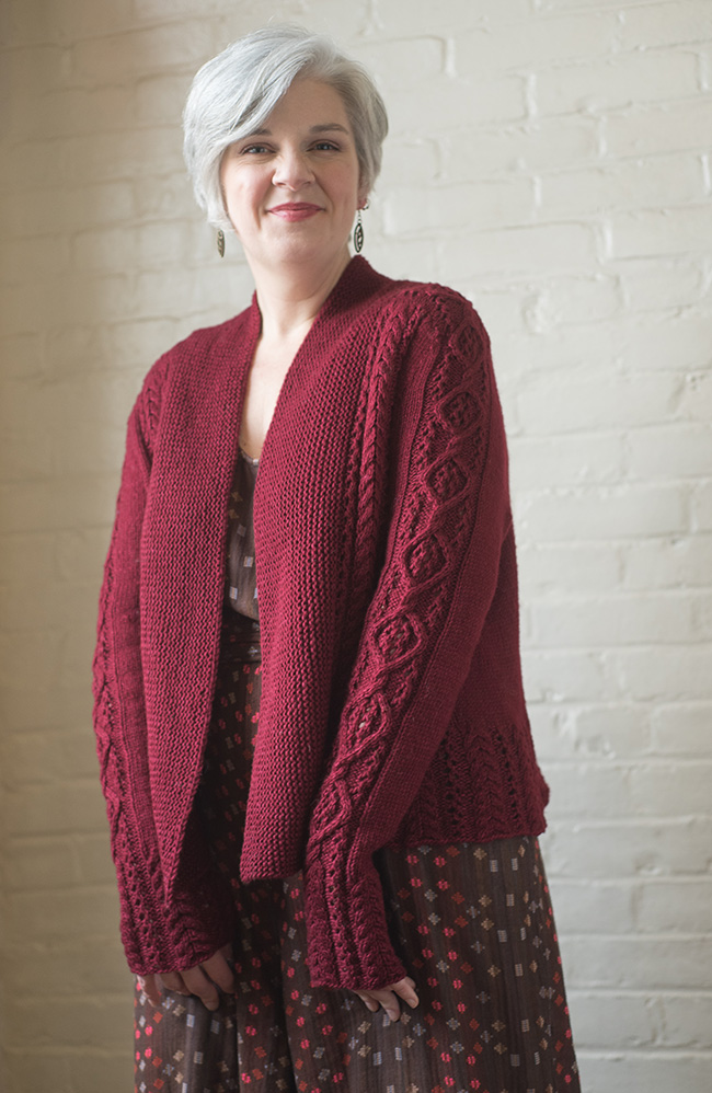 Free knitting pattern for a cabled cardigan for women