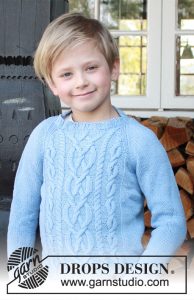 Knitted sweater for kids with raglan and cables free pattern