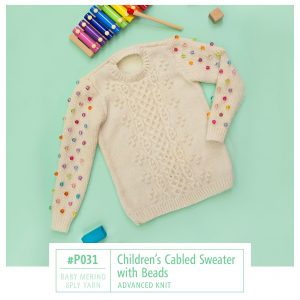 Free Knitting Pattern for a cabled kids sweater with beads