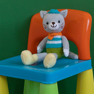 Free Knitting Pattern for an Amigurumi Cat with an Orange Scarf