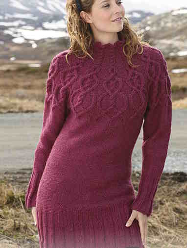 Red drop-shoulder tunic with yoke cable pattern.