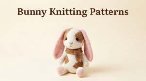 a knitted floppy ear bunny plush toy with a scarf